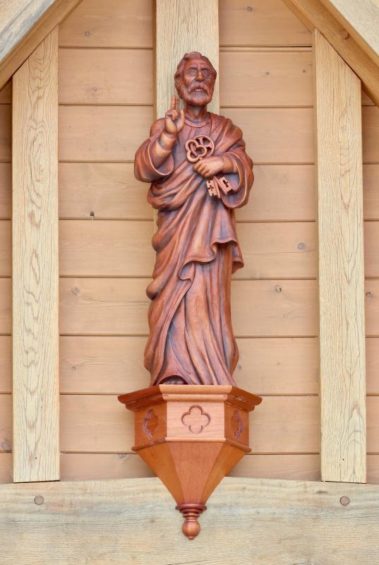 St. Peter is holding the keys to the kingdom and the church.